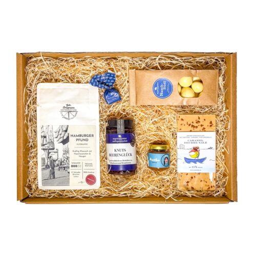 Ein Geschenk Hamburg wie diese Geschenkbox mit Feinkost kommt garantiert gut an.