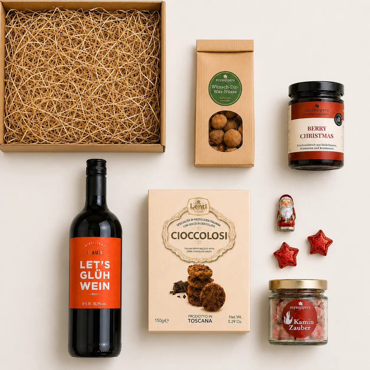 Inhalt von Santa Claus in the Box: Glühwein, Cioccolosi-Kekse, Zimt-Haselnüsse, Fruchtaufstrich Berry Christmas und kleiner Schoko-Weihnachtsmann
